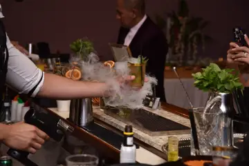 Cocktails served through dry-ice smoke
